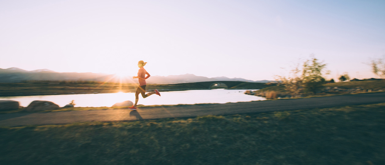 Woman jogging in the winter sun